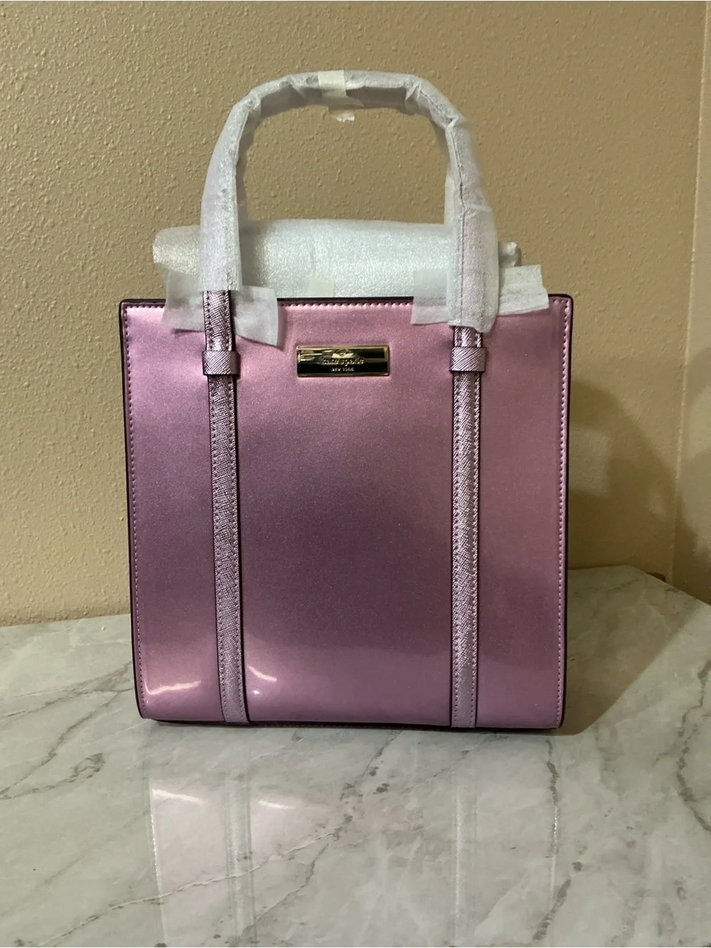 Kate Spade Mini Tote Metallic Quartz Pink.